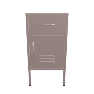 The Bromley, a small, 1 door metal locker with a drawer above it, in light pink, against a white background.